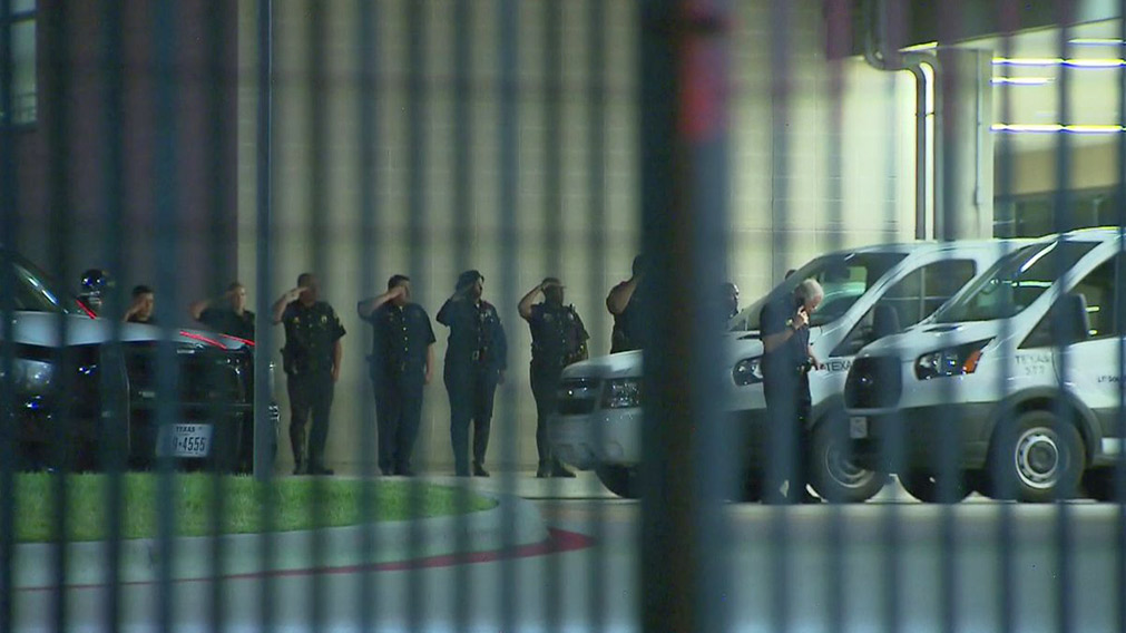 Dallas Police Officers Salute Their Fallen Brethren